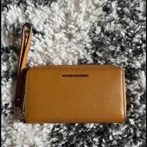 Mustard yellow Michael kors tech wallet